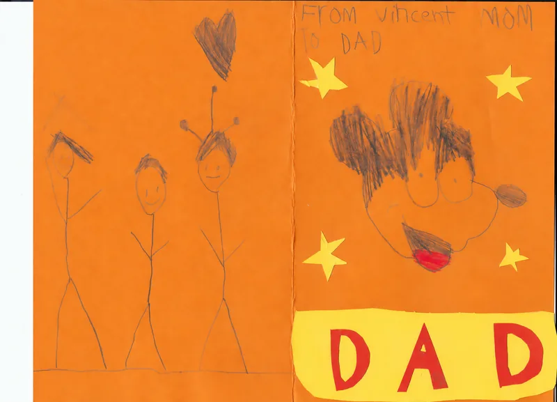 A handmade card on orange paper with pencil people, yellow stars, a pencil heart, and red paper DAD lettering